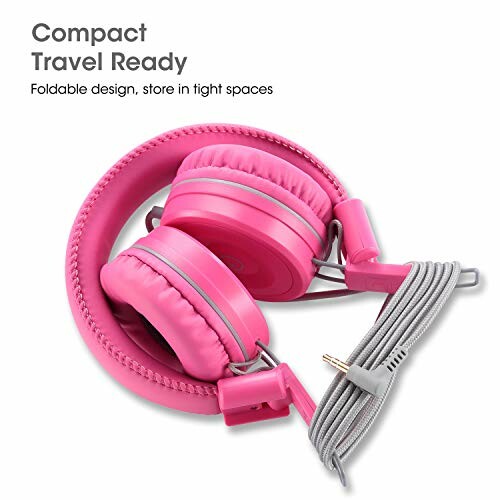 Foldable pink headphones with cord for travel.