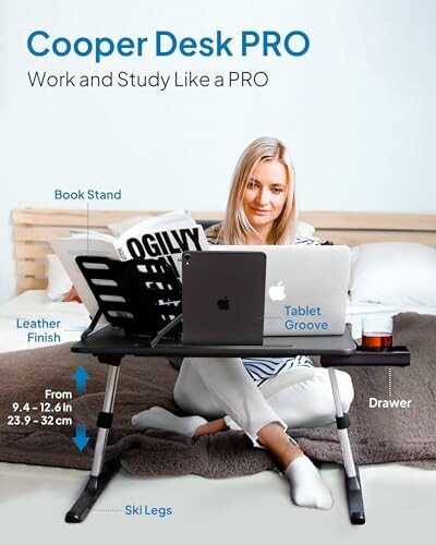 Woman using Cooper Desk PRO with adjustable legs, book stand, and tablet groove.