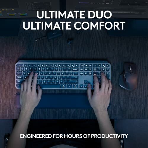 Hands typing on a keyboard with a mouse on the side, labeled 'Ultimate Duo Ultimate Comfort'.