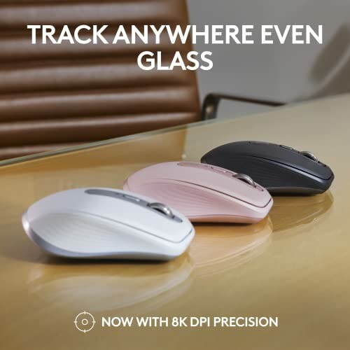 Three wireless mice on a table with text 'Track anywhere even glass. Now with 8K DPI precision.'